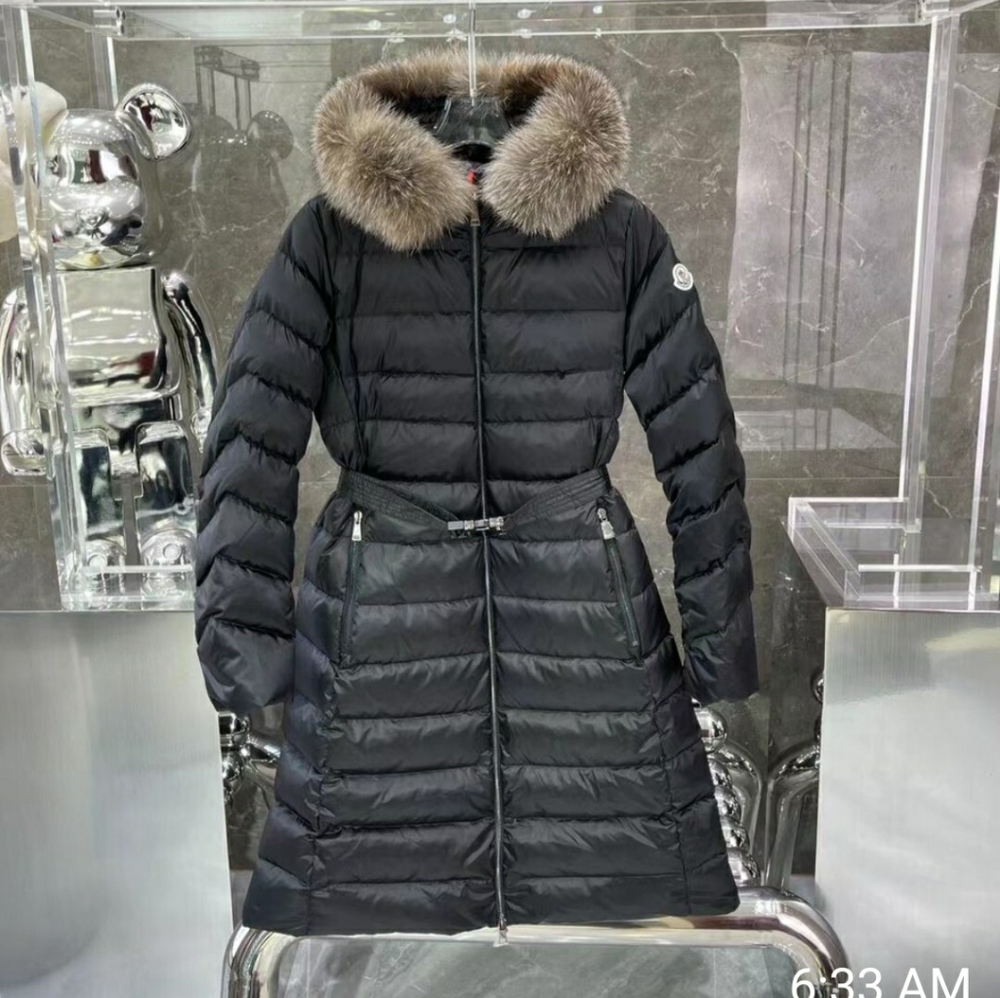 Moncler down coat. Natural far on hood, has belt, could be worn without